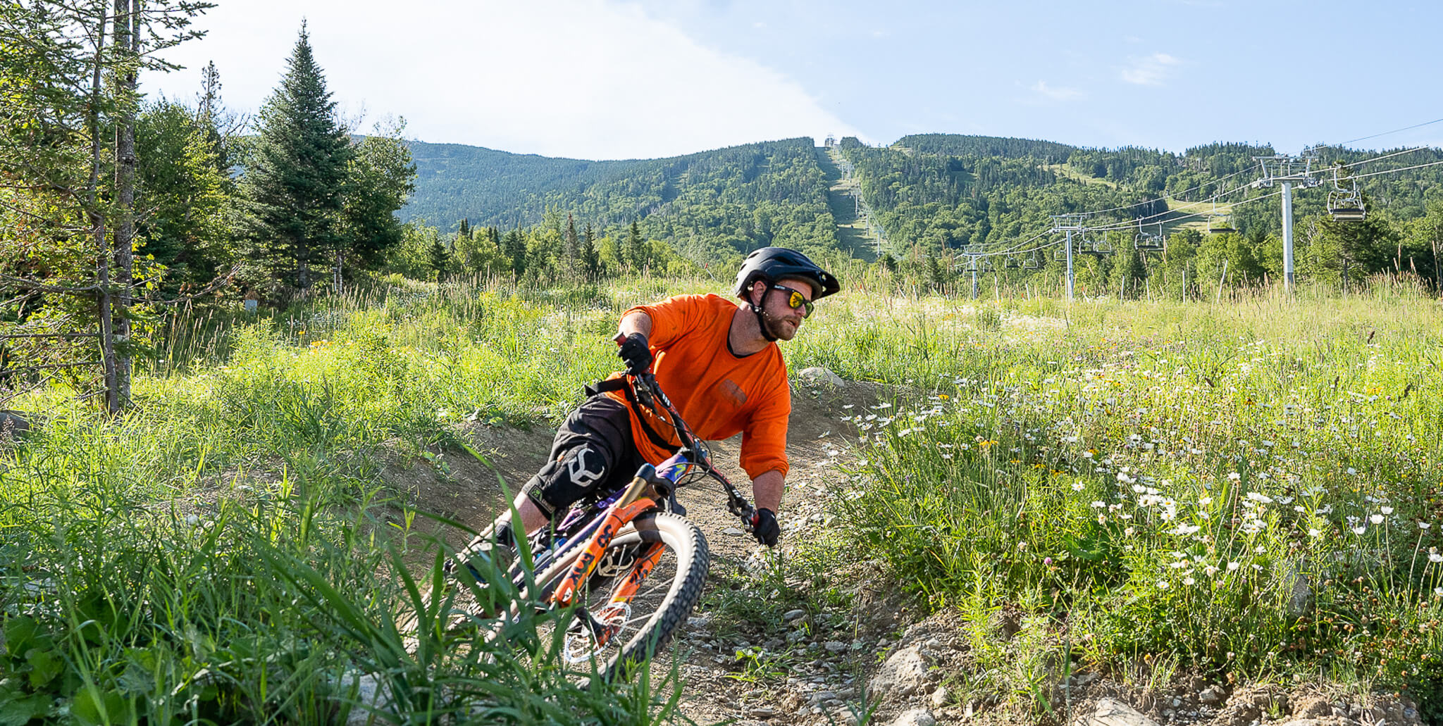 Bike rider in orange shirt